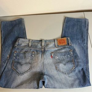 Levi’s 531 36x30 distressed blue jeans. Unique pockets.